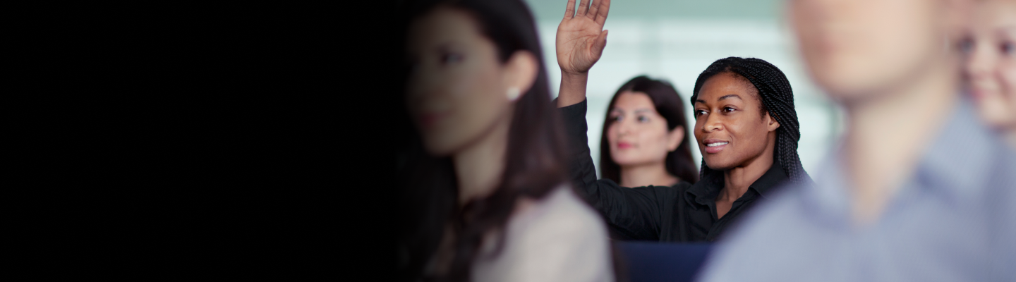 Akamai University student raises their hand